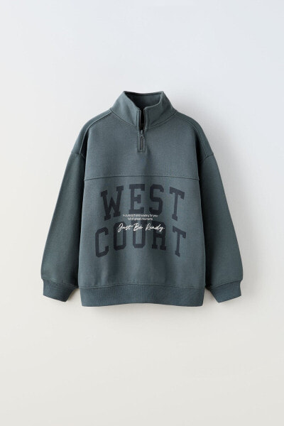 Quarter-zip sweatshirt with slogan