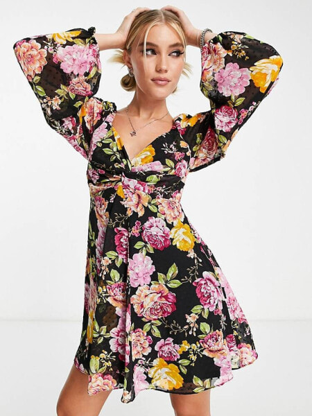 ASOS DESIGN babydoll godet skater mini dress with open back detail in bold floral