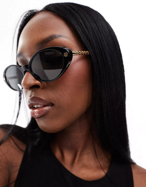 Versace metal slim cat eye sunglasses in black and gold