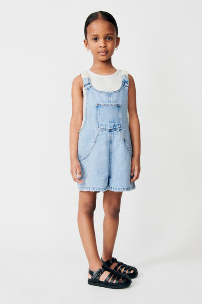 Short dungarees with crochet motifs