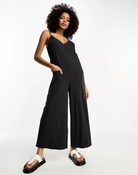 ASOS DESIGN – Jersey-Jumpsuit in Anthrazit mit Riemchenträgern