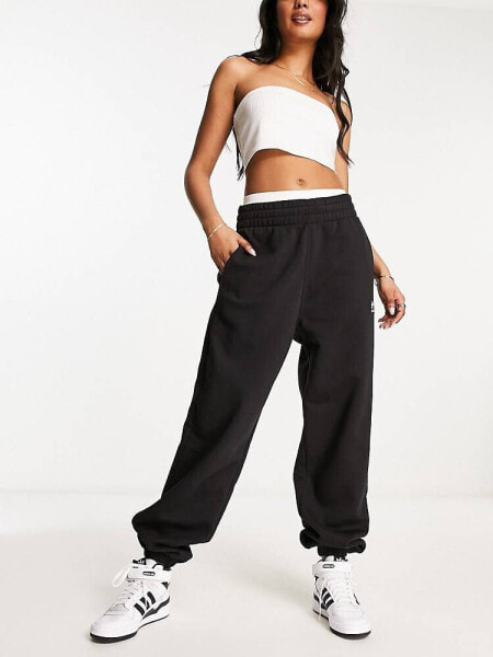 adidas Originals track pants in black - BLACK