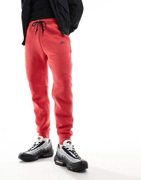 Nike Tech Fleece joggers in red