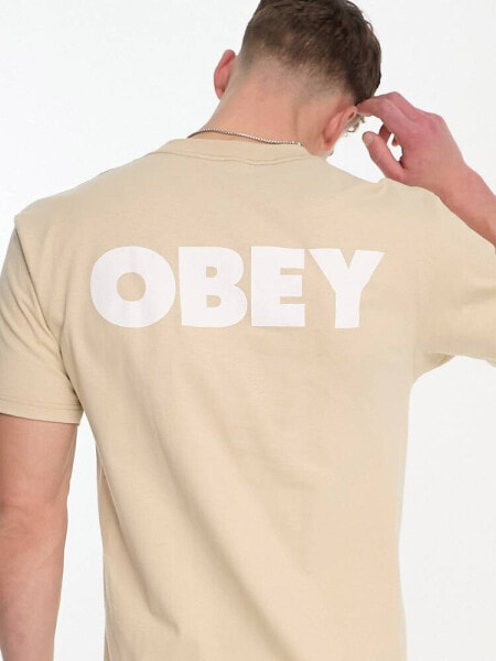 Obey – T-Shirt in Beige mit großem Logoaufdruck hinten