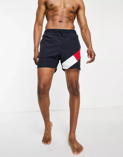 Tommy Hilfiger flag leg logo mid length swim shorts in navy