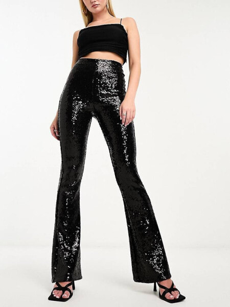 Commando sequin flare leggings in black