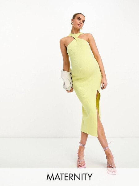 The Frolic Maternity midi dress with twist high neck and side slit in yellow
