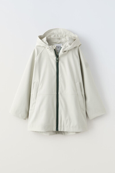 Rubberised parka with hood