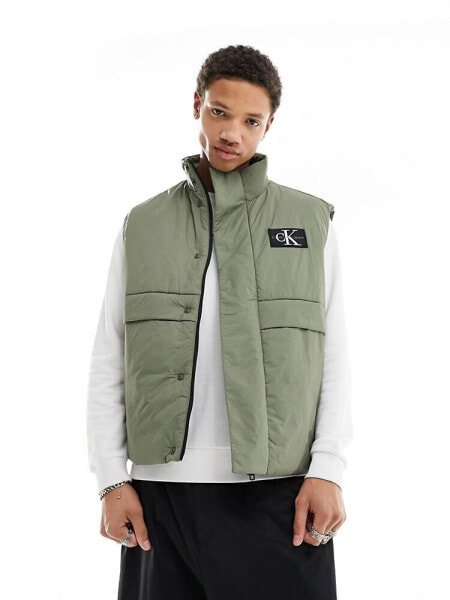 Calvin Klein Jeans transitional badge logo vest in olive