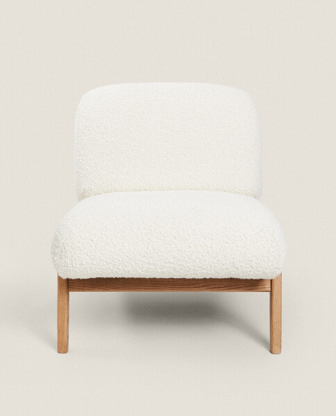 Upholstered bouclé wool armchair