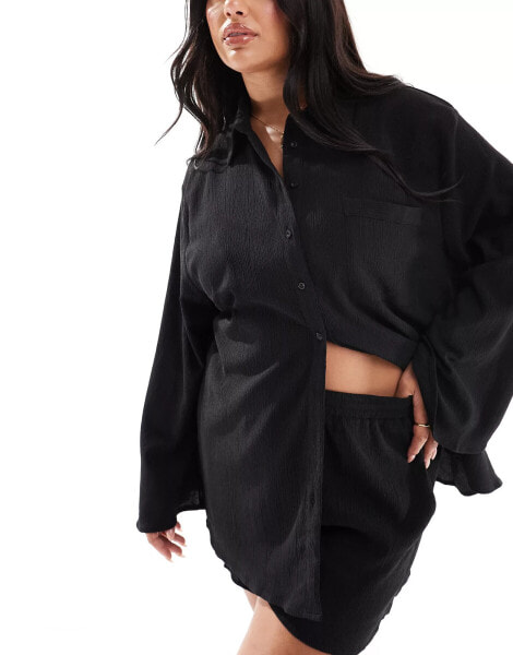 In The Style Plus x Perrie Sian exclusive textured oversized beach shirt co-ord in black