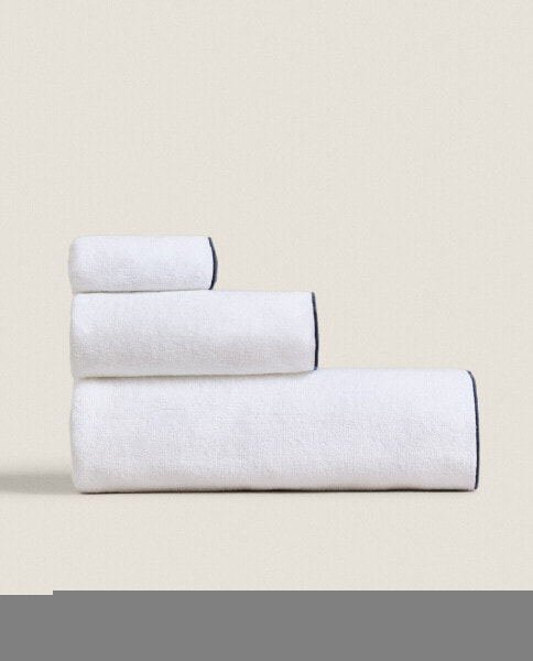 Cotton towel with overlock