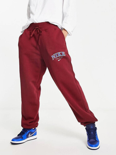 Nike Unisex Varsity phoenix fleece joggers in team red