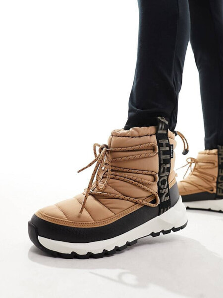 The North Face Thermoball insulated lace up boots in beige and black