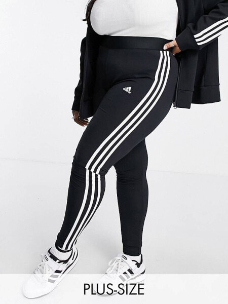 adidas Sportswear Plus Essential leggings with three stripes in black