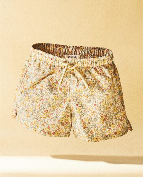 Children’s beach swim shorts made with liberty fabric