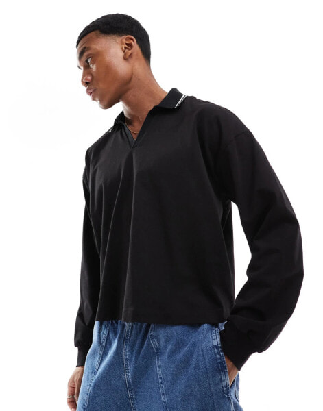 ASOS DESIGN boxy oversized polo with collar tipping in black