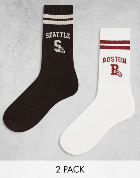 ASOS DESIGN 2 pack sports socks with Boston and Seattle graphics in ecru and brown