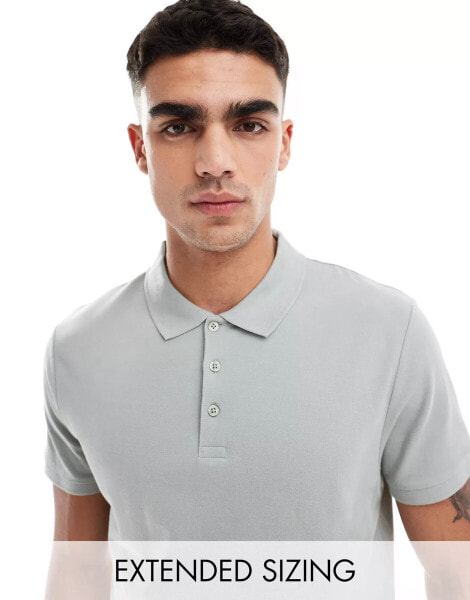 ASOS DESIGN pique polo in washed green