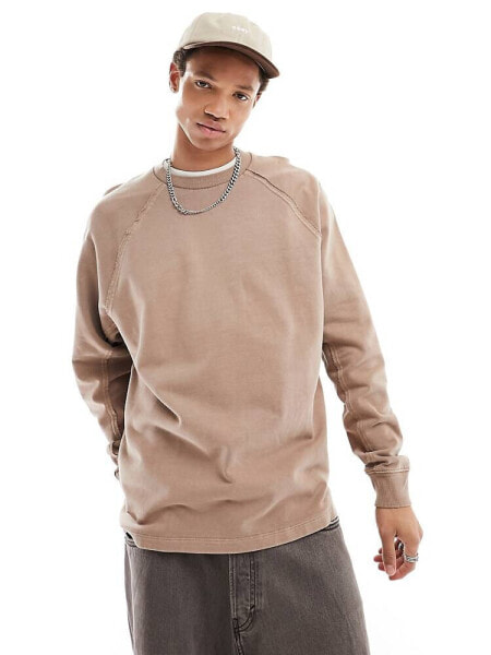 ASOS DESIGN oversized sweatshirt in washed brown with seam detail