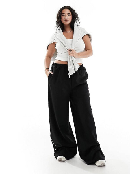 In The Style Plus contrast drawstring waist wide leg side stripe trousers in black