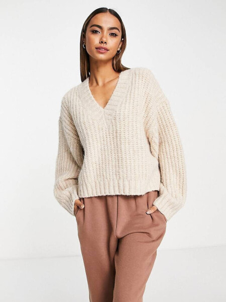 ASOS DESIGN premium chunky v neck oversized jumper in fluffy yarn in stone