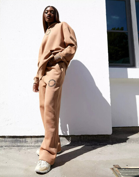 ASOS Weekend Collective straight leg jogger co-ord with circle logo in camel