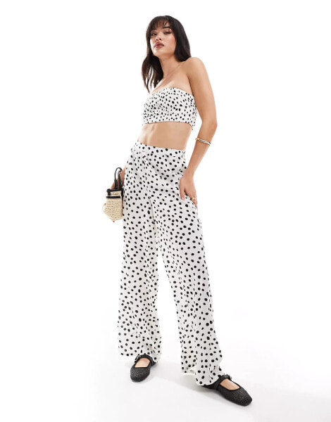 Wednesday's Girl polka dot wide leg trousers in white