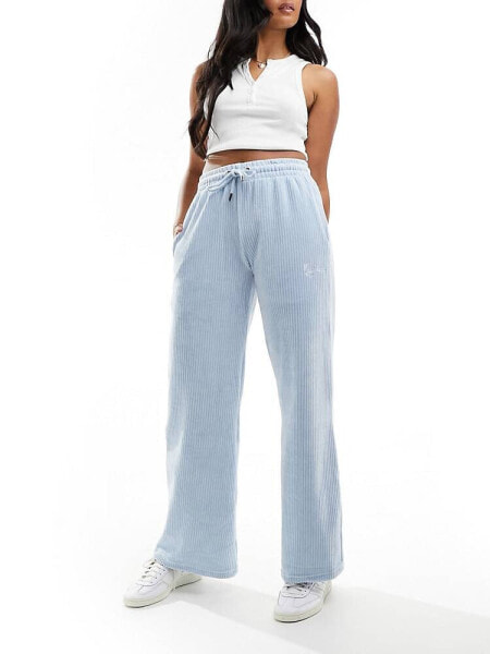 Karl Kani small signature wide leg corduroy trousers in light blue