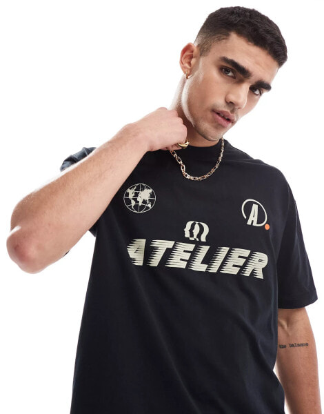 ASOS DESIGN oversized t-shirt with sports front print in black