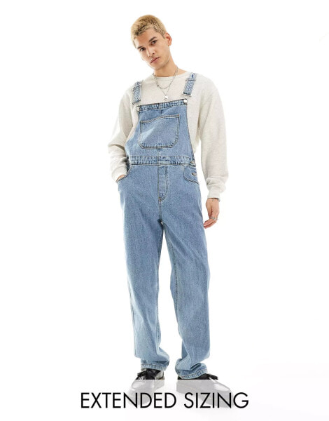 ASOS DESIGN denim dungarees in mid wash blue