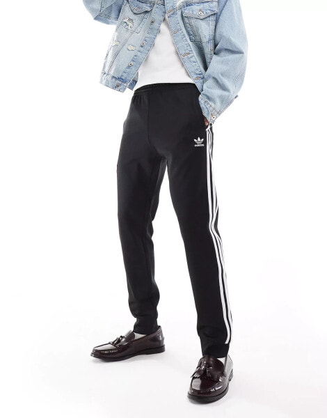 adidas Originals Superstar trackpants in black