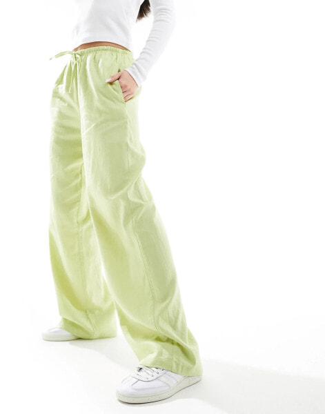 Bershka tie waist wide leg linen trousers in pistachio