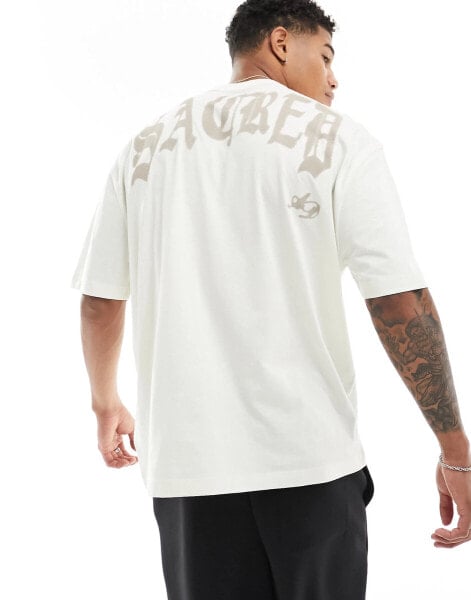 ASOS DESIGN oversized t-shirt in off white with across the back text print