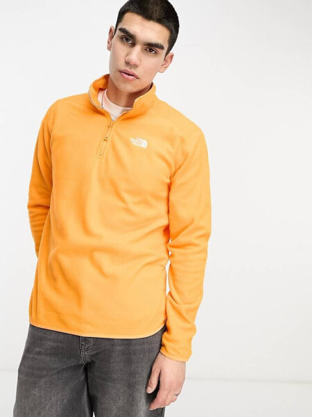 The North Face Glacier 100 1/4 zip fleece in orange