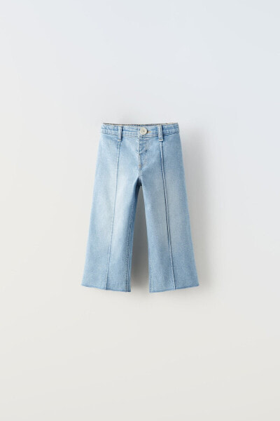 Расклешенные джинсы с декоративной строчкой ZARA