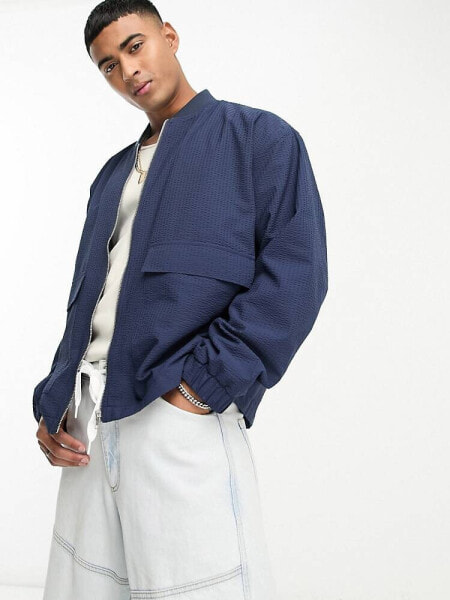 ASOS DESIGN oversized seersucker bomber jacket in navy 