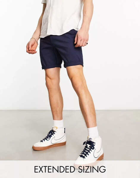 ASOS DESIGN skinny chino shorts in mid length in navy