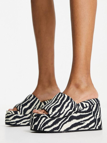 ASOS DESIGN Thierry mule wedges in zebra