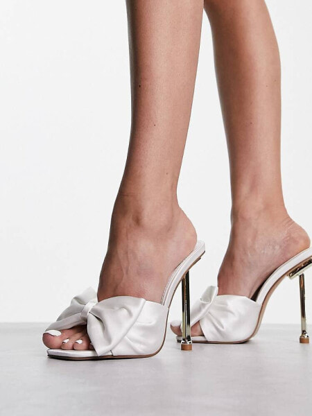 Glamorous bow heeled sandals in white