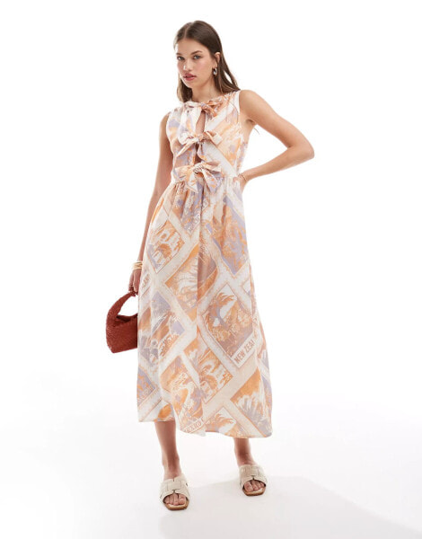 ASOS DESIGN sleeveless tie front maxi dress in postcard print