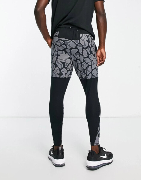 Nike Running DYE Stride Dri-FIT printed joggers in grey