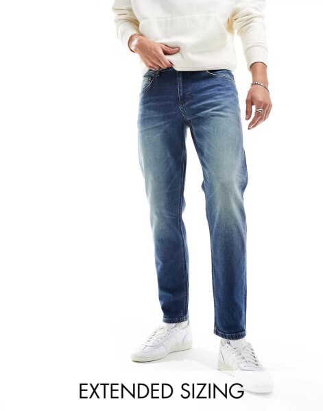 ASOS DESIGN stretch tapered jeans in tinted vintage wash