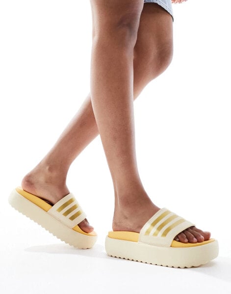 adidas Training Adilette platform sliders in sand and gold