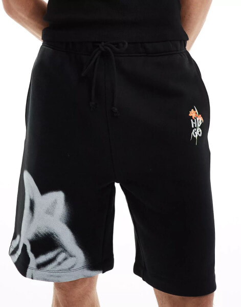 HUGO Red diflowos jersey shorts in black with floral stencil print