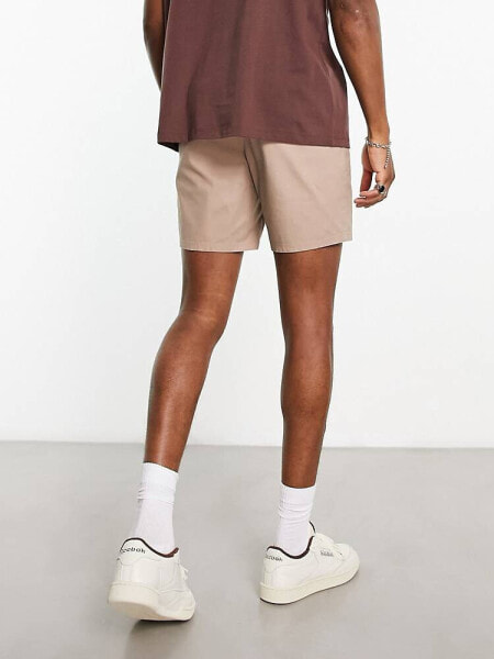 ASOS DESIGN slim chino shorts in mid length in brown 