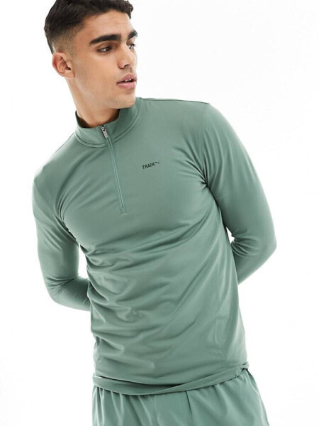 Puma Training Evolve 1/4 zip sweatshirt in light green