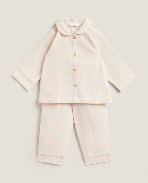 Kid’s striped flannel set of pyjamas