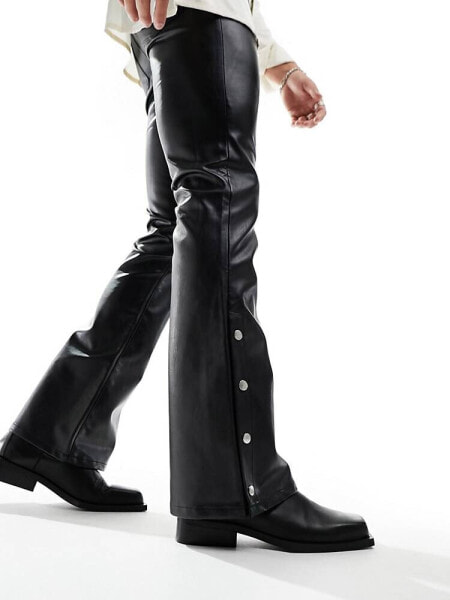 ASOS DESIGN flared trouser with split hem and popper detail in black leather look