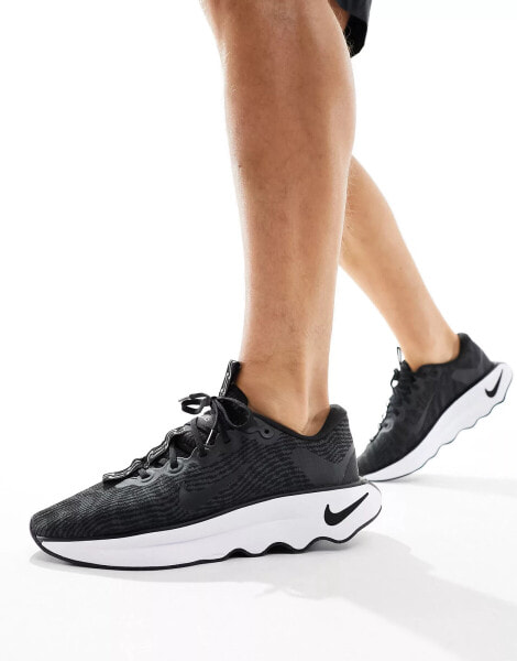 Nike Training Motiva trainers in black and white